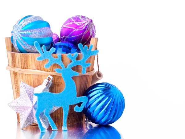 Blue and silver Xmas decoration with wooden bucket — Stock Photo, Image