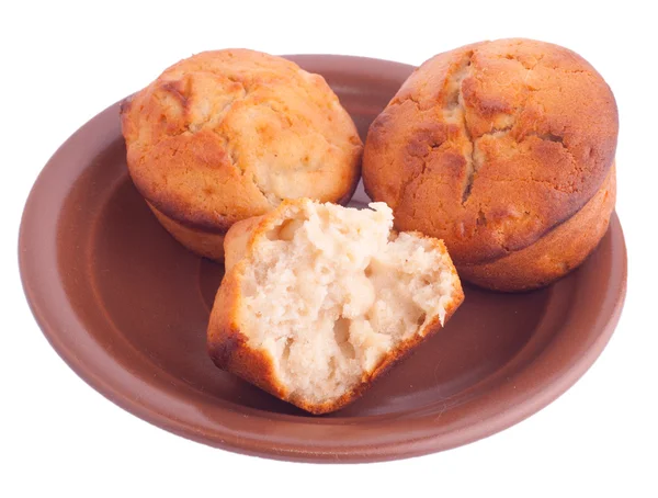 Muffins on brown saucer — Stock Photo, Image