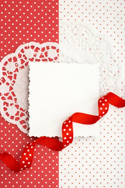 Decorative card with red ribbon