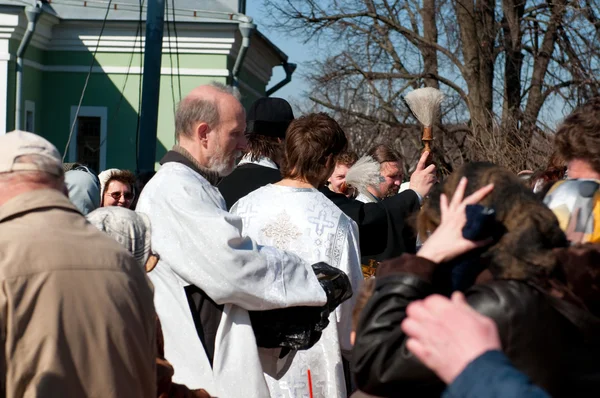 Eastern cake blessing by the priest — Stock Photo, Image