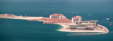 View on luxury hotels on artificial island Palm Jumeirah, Dubai, United Arab Emirates clipart