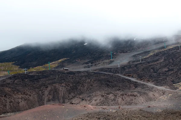 Cabin cableway in fog on Etna volcano — Stock Photo, Image