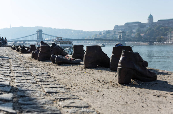 Shoes on the bank of the Danube River in Budapest - Memorial in honour of the Jews who were executed by the river Danube in Budapest by Hungarian Nazis during the World War II