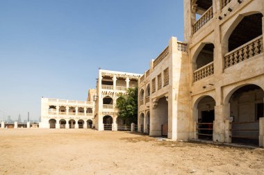 View of the street in Souq Waqif,  a marketplace (souq) in Doha, in the state of Qatar