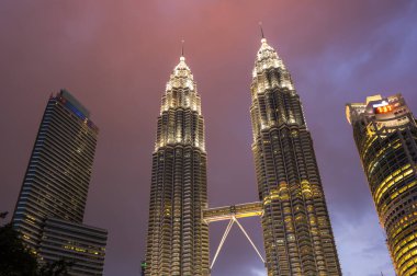 KUALA LUMPUR, MALAYSIA - 31 JANUARY, 2020: The Petronas Towers, also known as the Petronas Twin Towers are twin skyscrapers in Kuala Lumpur, Malaysia