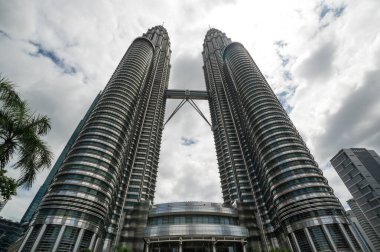 KUALA LUMPUR, MALAYSIA - 01 FEBRUARY, 2020: The Petronas Towers, also known as the Petronas Twin Towers are twin skyscrapers in Kuala Lumpur, Malaysia