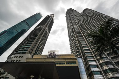 KUALA LUMPUR, MALAYSIA - 01 FEBRUARY, 2020: The Petronas Towers, also known as the Petronas Twin Towers are twin skyscrapers in Kuala Lumpur, Malaysia