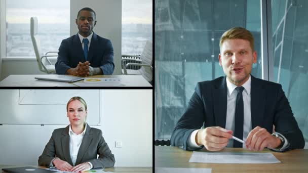 Jóvenes empresarios que se comunican por videoconferencia en la oficina. Discutiendo el proyecto en línea. Vista de cámara web — Vídeo de stock