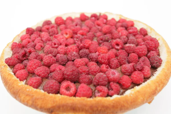 Fruit tart covered in raspberries — Stock Photo, Image