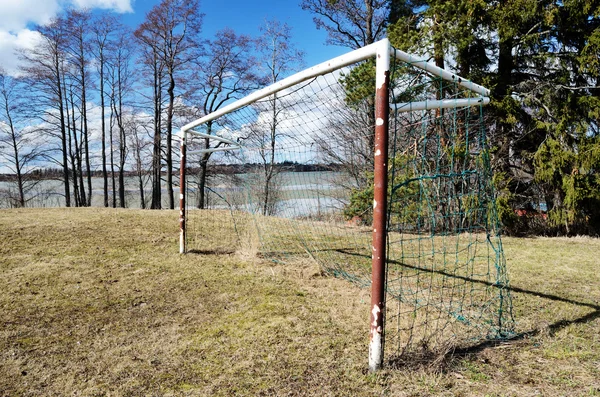 Old soccer goal on the village sports field — Stock Photo, Image