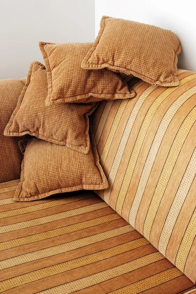 Striped brown sofa and four pillows — Stock Photo, Image