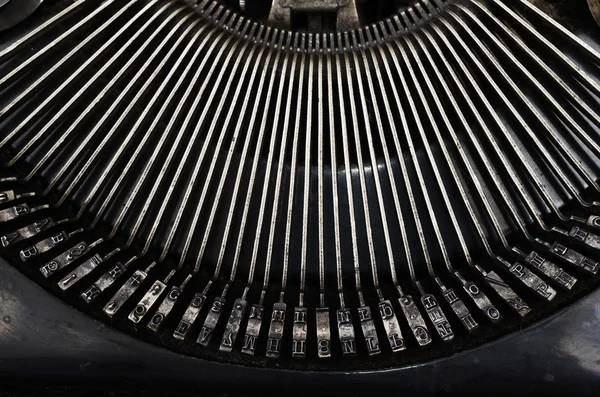 Part of vintage portable typewriter with letters — Stock Photo, Image