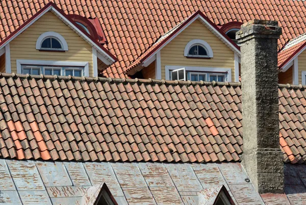 old tile roofs, chimney and windows