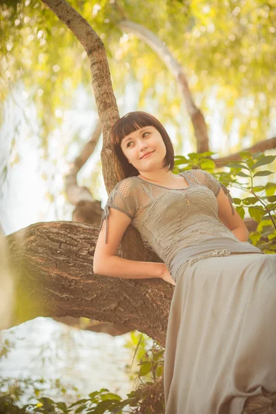 Beautiful girl in a forest — Stock Photo, Image