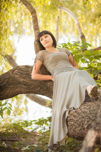 Beautiful girl in a forest — Stock Photo, Image