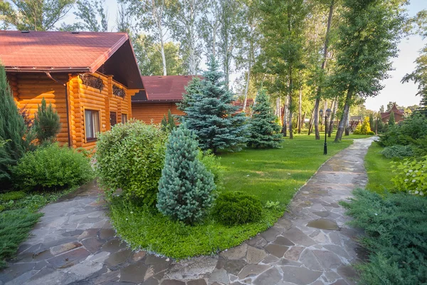 Holiday apartment - wooden cottage in forest — Stock Photo, Image