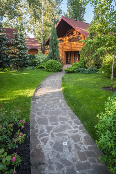 Holiday apartment - wooden cottage in forest — Stock Photo, Image