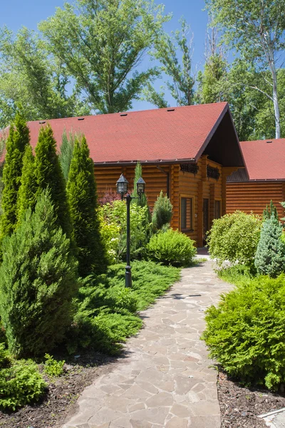 Holiday apartment - wooden cottage in forest Royalty Free Stock Images