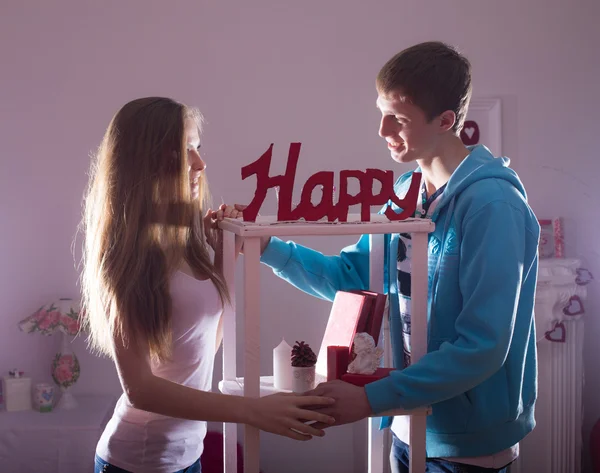 Beautiful young smiling couple — Stock Photo, Image