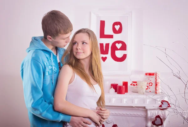 Beautiful young smiling couple — Stock Photo, Image