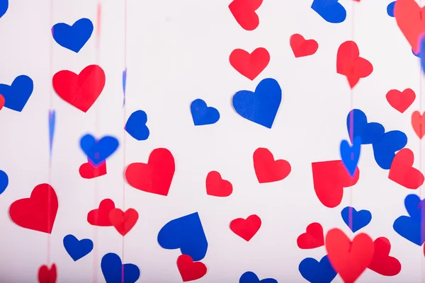 Achtergrond van rood en blauw papier harten — Stockfoto