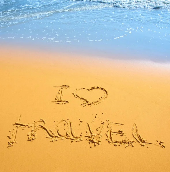Handwritten Words Love Travel Sand Tropical Beach Wave Background — Stock Photo, Image
