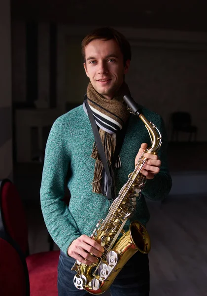 Young Guy Music Artist Jazzman Holding Saxophone His Hands Dark — Stock Photo, Image