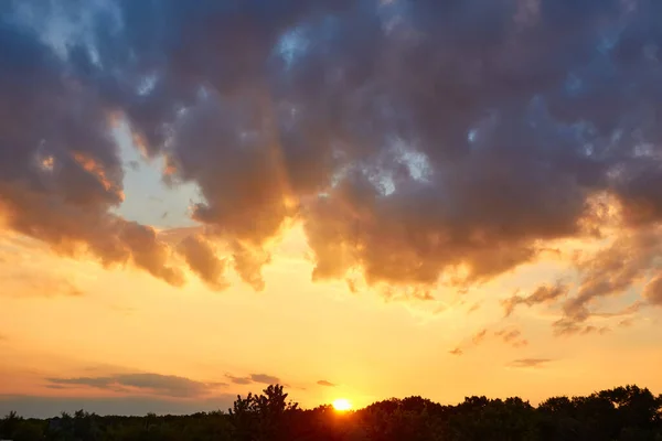 Beautiful, heavy clouded blue sunset sky background.