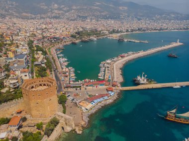 An aerial view of the bay Alanya in Antalya Turkey. Sea and city with an open sky. Kizil Kule - Alanya