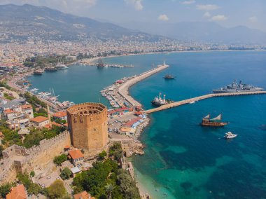 An aerial view of the bay Alanya in Antalya Turkey. Sea and city with an open sky. Kizil Kule - Alanya