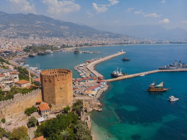 An aerial view of the bay Alanya in Antalya Turkey. Sea and city with an open sky. Kizil Kule - Alanya