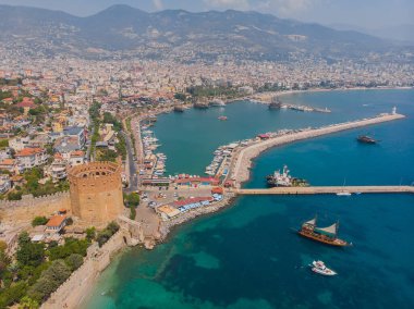 Awesome view of the Kizil Kule by the Mediterranean Sea in Alanya, Turkey. The Red Tower is a popular tourist attraction in Turkey.