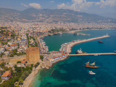 Awesome view of the Kizil Kule by the Mediterranean Sea in Alanya, Turkey. The Red Tower is a popular tourist attraction in Turkey.