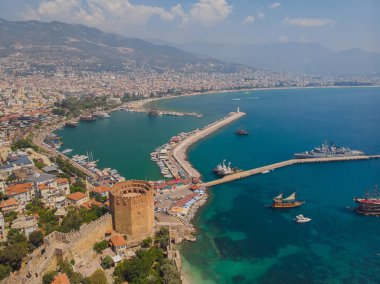 Awesome view of the Kizil Kule by the Mediterranean Sea in Alanya, Turkey. The Red Tower is a popular tourist attraction in Turkey.