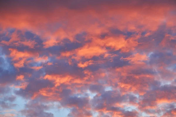 Sunset sky, clouds painted in bright colors over Kyiv, Ukraine