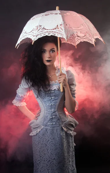 Surprised beautiful Halloween vampire woman aristocrat with lace — Stock Photo, Image