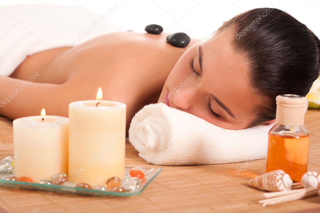 Attractive woman getting spa treatment isolated on white backgro