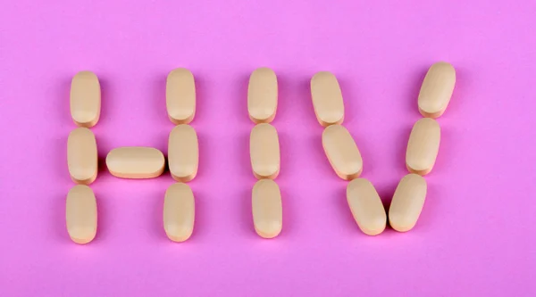 Hiv терапия efavirenz на розовом фоне — стоковое фото
