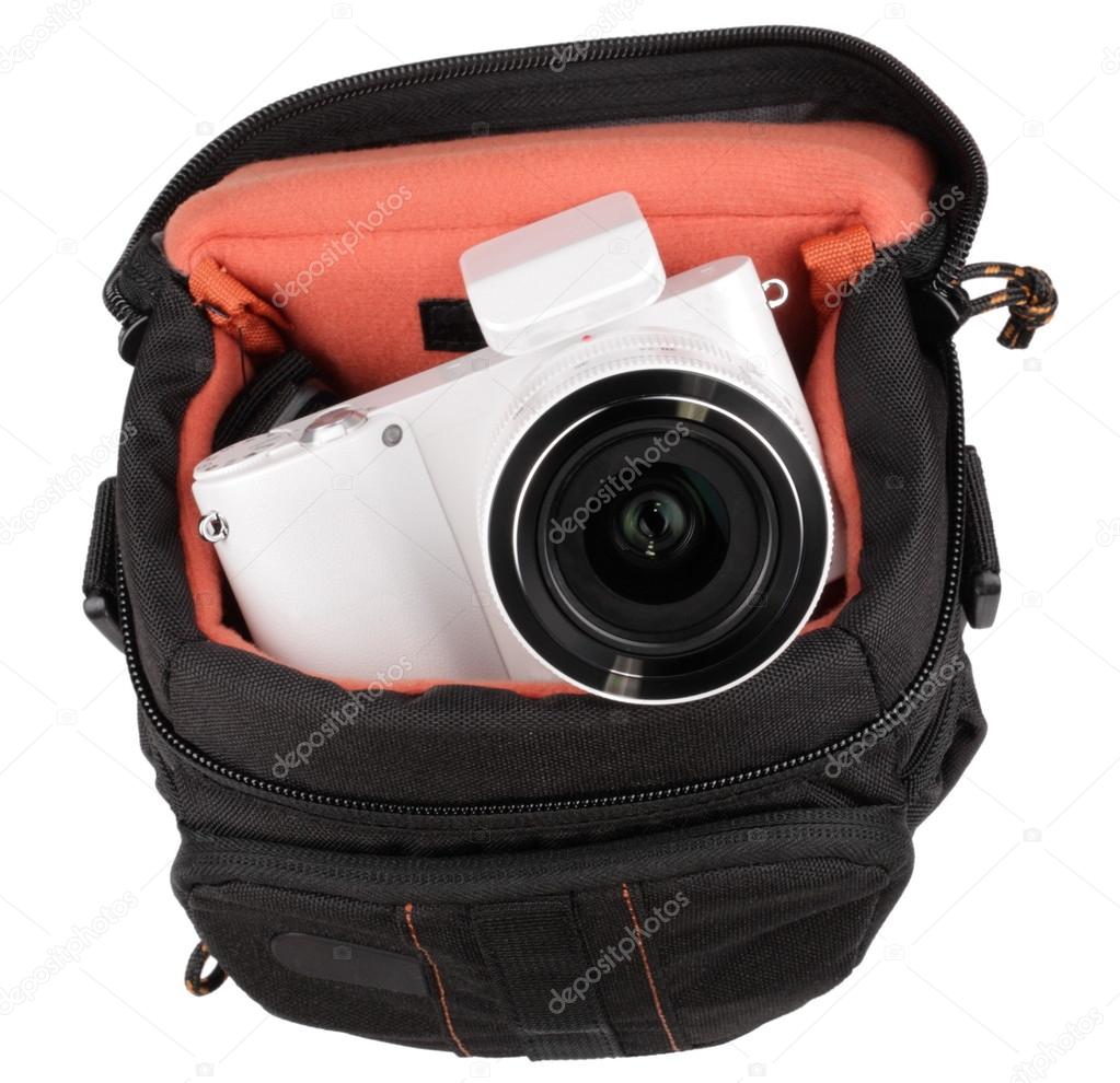 White photo camera in case isolated