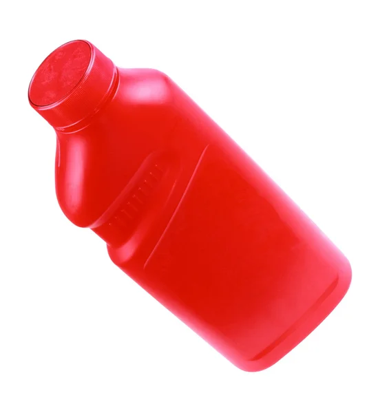 Czerwona plastikowa butelka izolowana — Zdjęcie stockowe