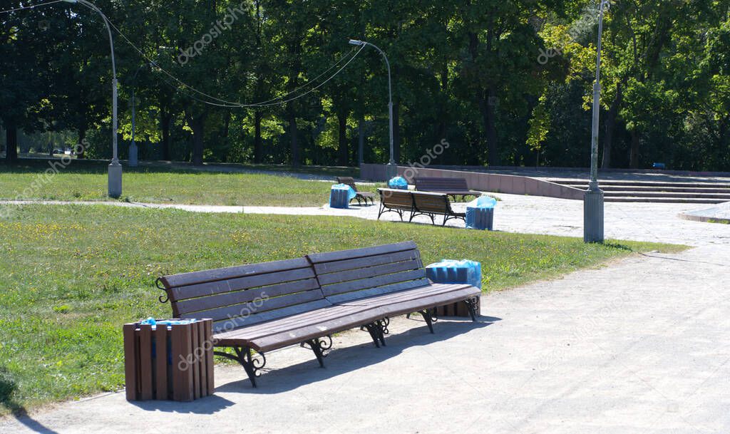 bench  in park at dry sunny summer day