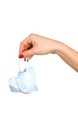 Bir maske tutan kadının el