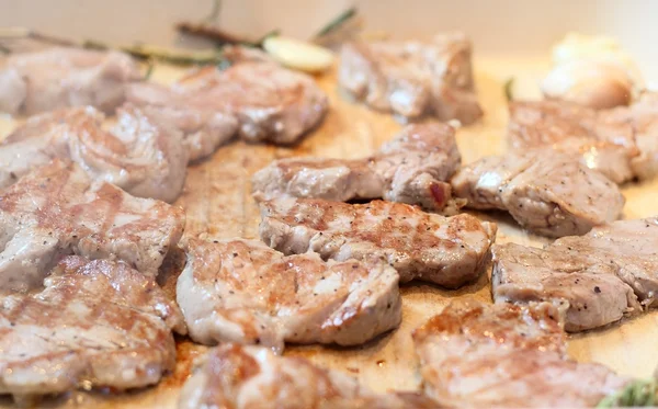 Meat slices roasted on giddle — Stock Photo, Image