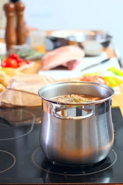 Saucepan with soup — Stock Photo, Image