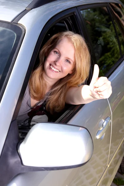 Happy girl in car — Stock Photo, Image