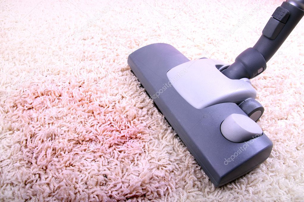 Vacuuming very dirty white carpet Stock Photo by ©ambrozinio 14747901