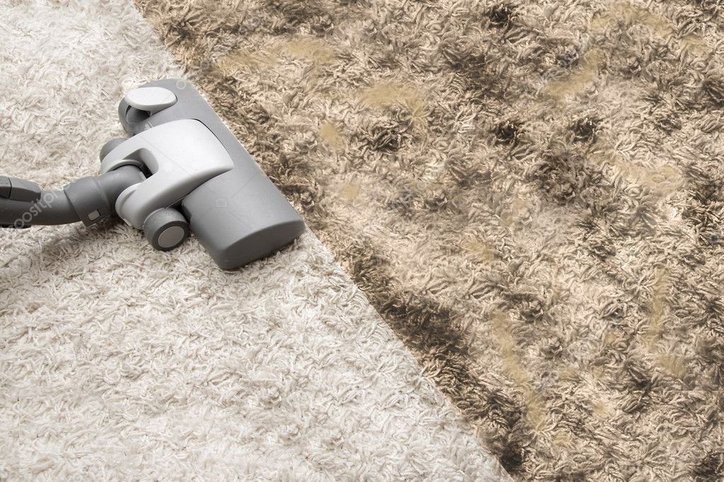 Vacuuming very dirty carpet — Stock Photo © ambrozinio 24178919