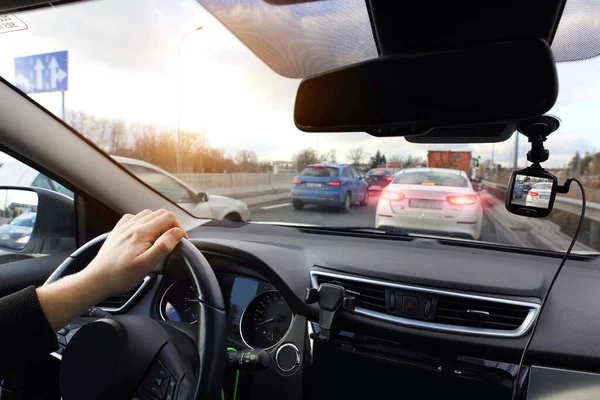 Driving in a traffic jam with a video recorder