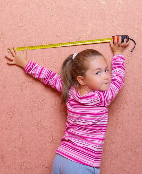 Girl with measuring tape — Stock Photo, Image