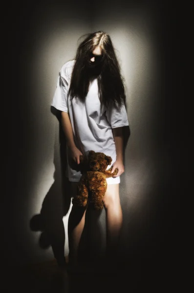 Young zombie girl with teddy bear (ancient version) — Stock Photo, Image